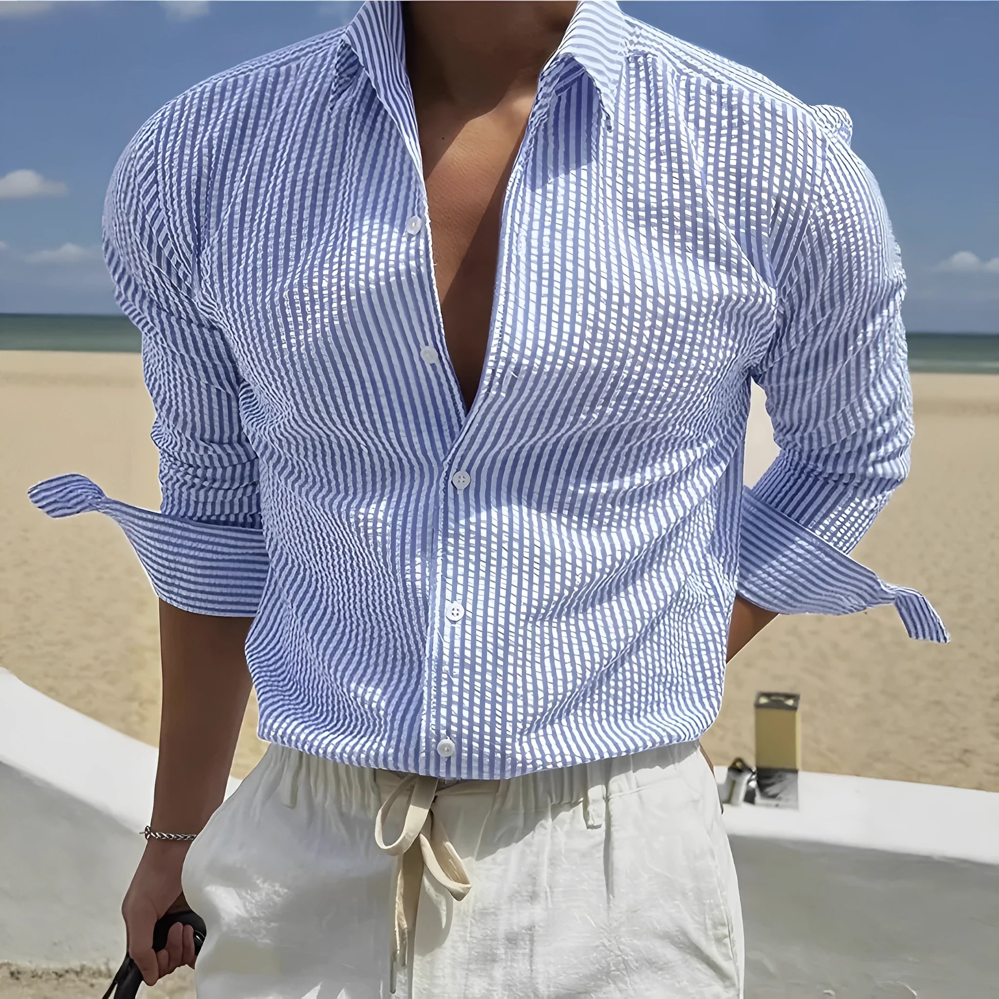 Blue striped long sleeve shirt with a cardigan lapel collar on a hanger