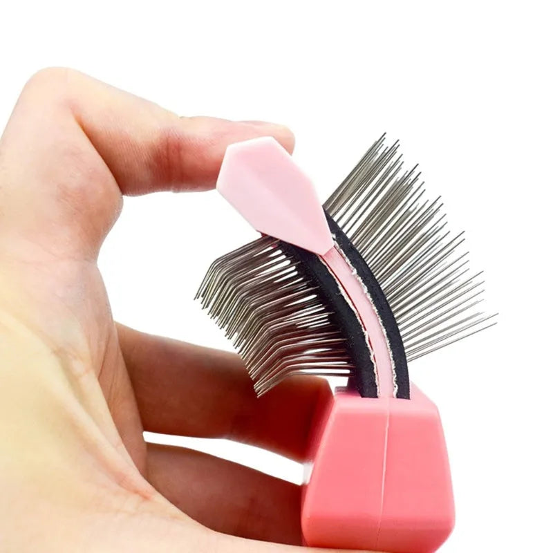 Double-sided pet brush with stainless steel pins and blue ergonomic handle for grooming dogs and cats