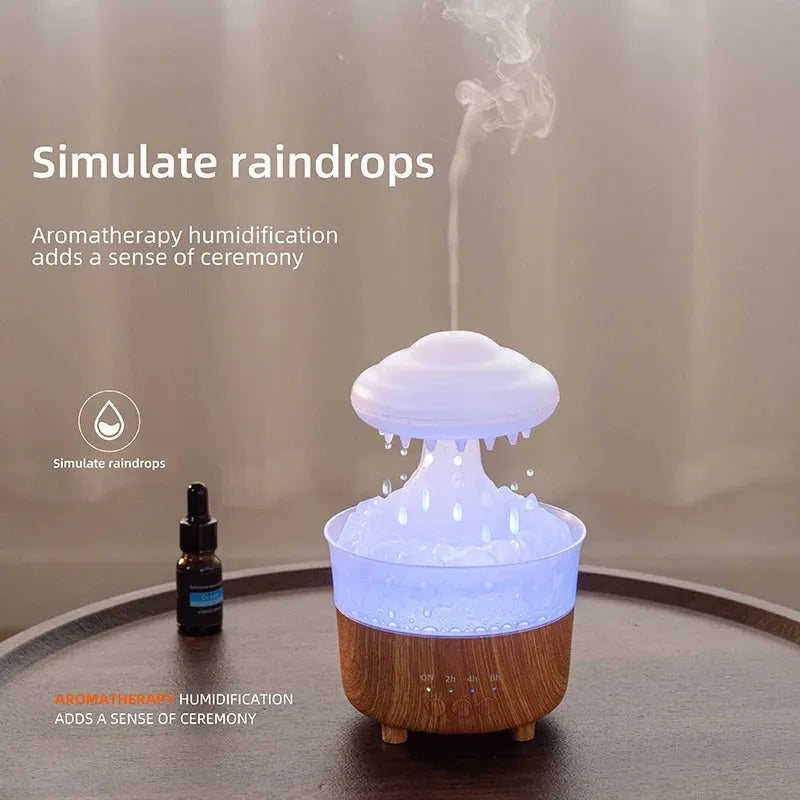 Wood grain rain cloud shaped humidifier diffuser with coloured LED light and water droplet sound.