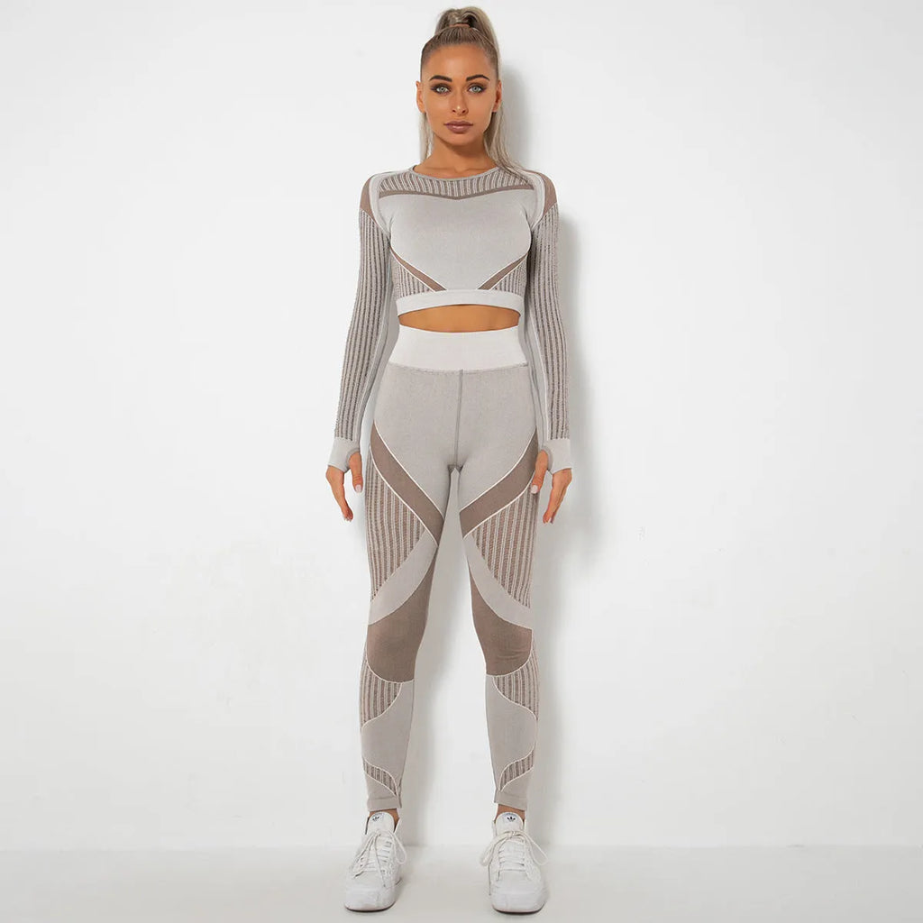Women's long-sleeved seamless yoga suit in a striped pattern, shown in a stretch fabric suitable for exercise.