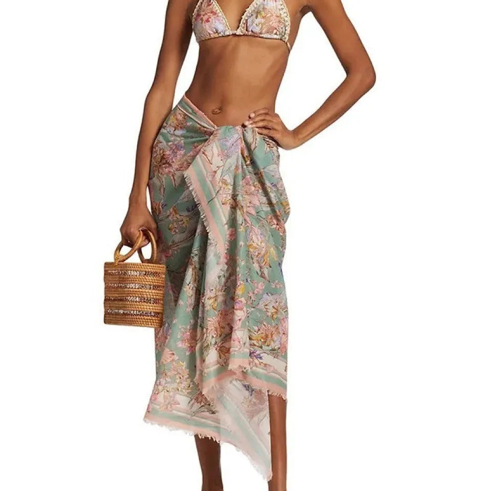 Women's floral bikini suit with skirt in creamy-white nylon for beach swimming