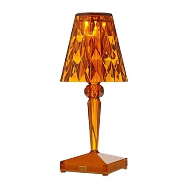 Portable touch projection night light with rose gold plating and acrylic construction, showing compact design for bedroom or bar use