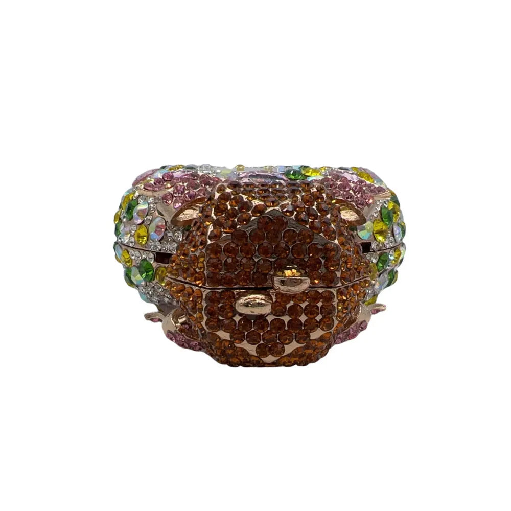 Women's hard alloy clutch bag with full diamond coverage in a golden colour.