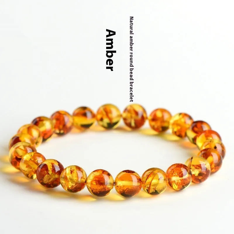 Natural yellow piebald amber bracelet with geometric beads and water purification properties
