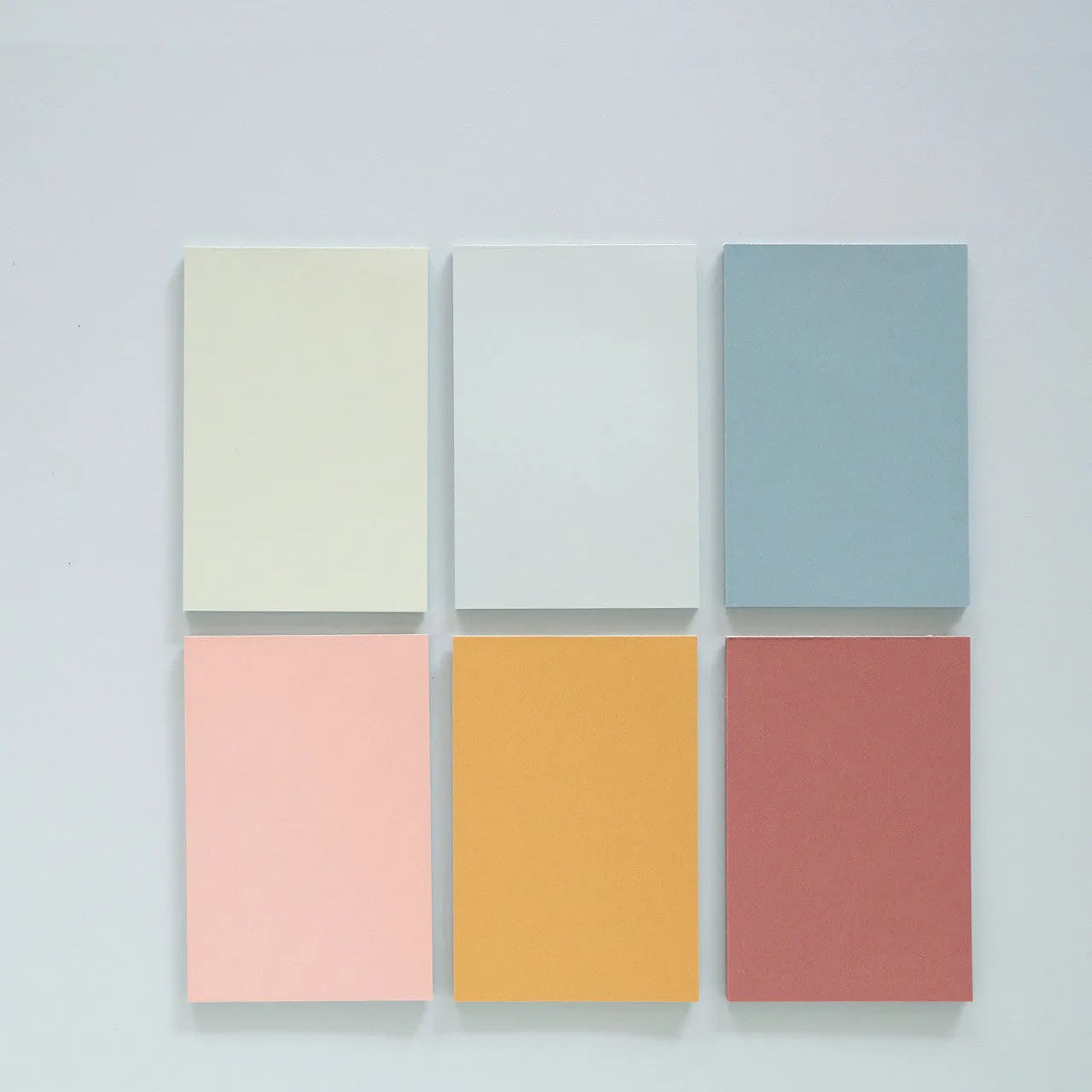 Pack of large 12cm x 8cm sticky notes in six different colours, 150 sheets total