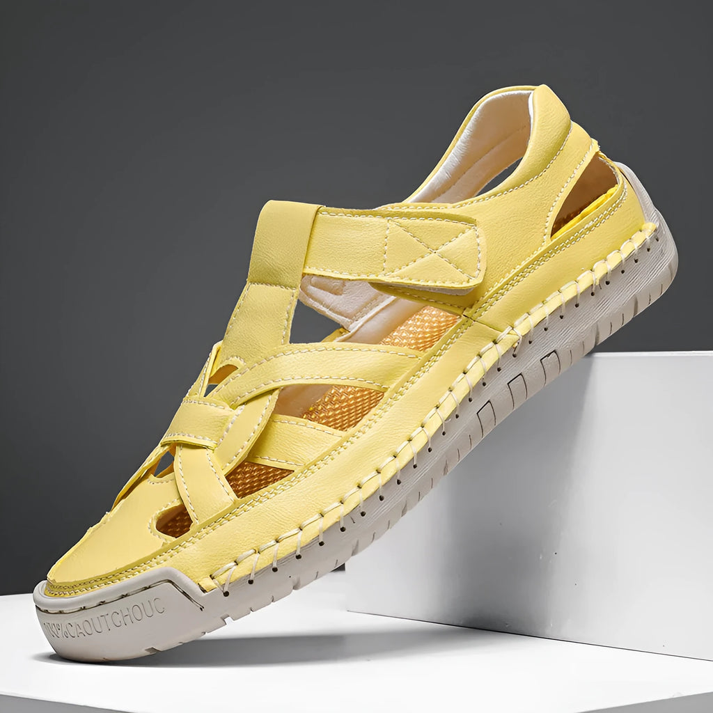 Lightweight women's low-top casual shoes with Velcro strap and soft rubber sole in a solid colour.