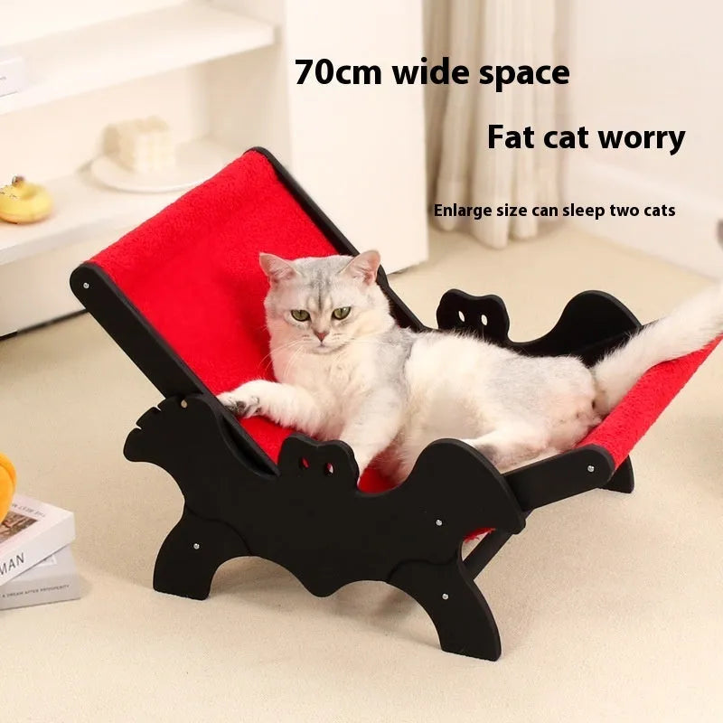 Wooden cat recliner with bat-shaped backrest in black and red Halloween colours