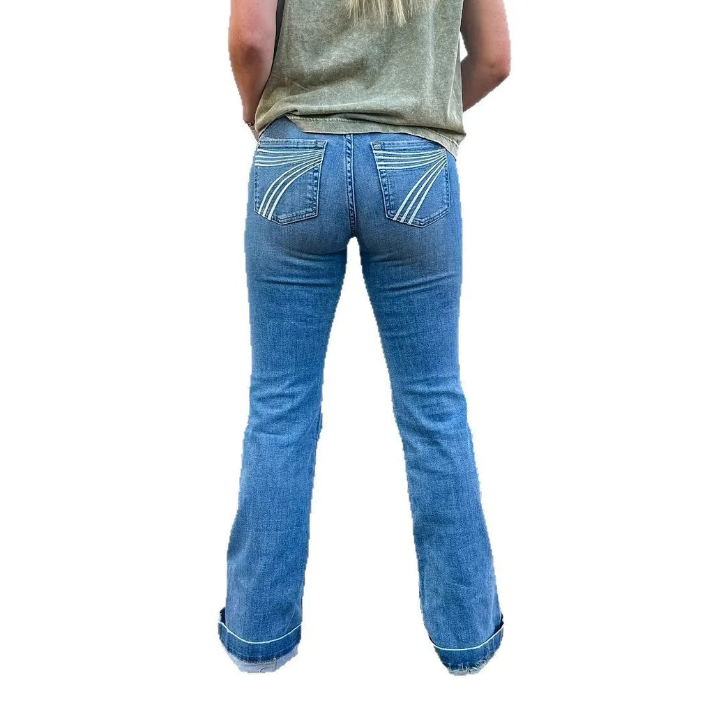 Slim fit elastic mid-waist slightly flared jeans with embroidered details in blue, showing slight flare from knee to hem