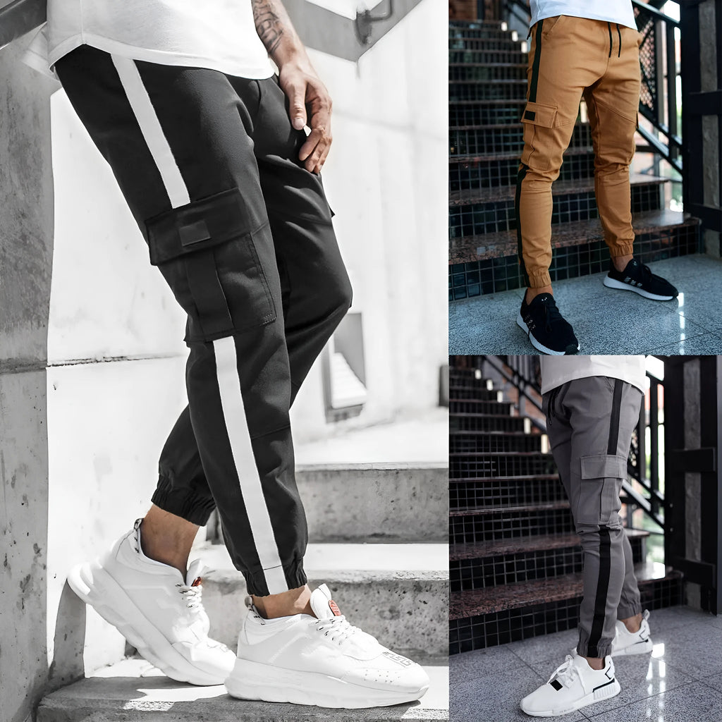 Men's leather-look casual trousers in khaki, black, or dark grey with middle waist and zip fly.