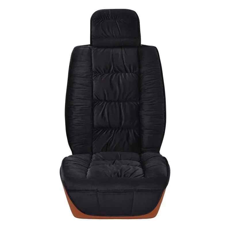 Short plush winter car seat cushion in grey on a car seat.