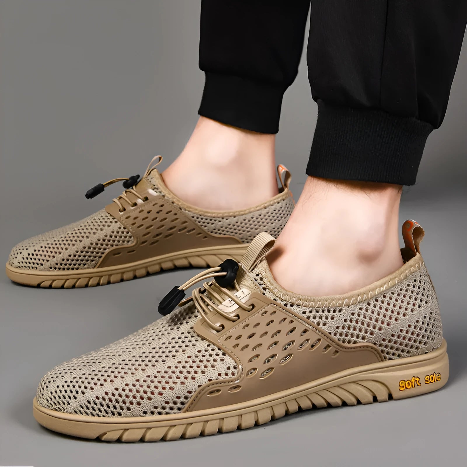 Men's breathable mesh casual shoes in black, grey, and sand colours with rubber sole