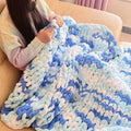 Coarse yarn chenille knitted blanket with braided edges showing texture detail, available in 12 sizes from 50cm to 200cm