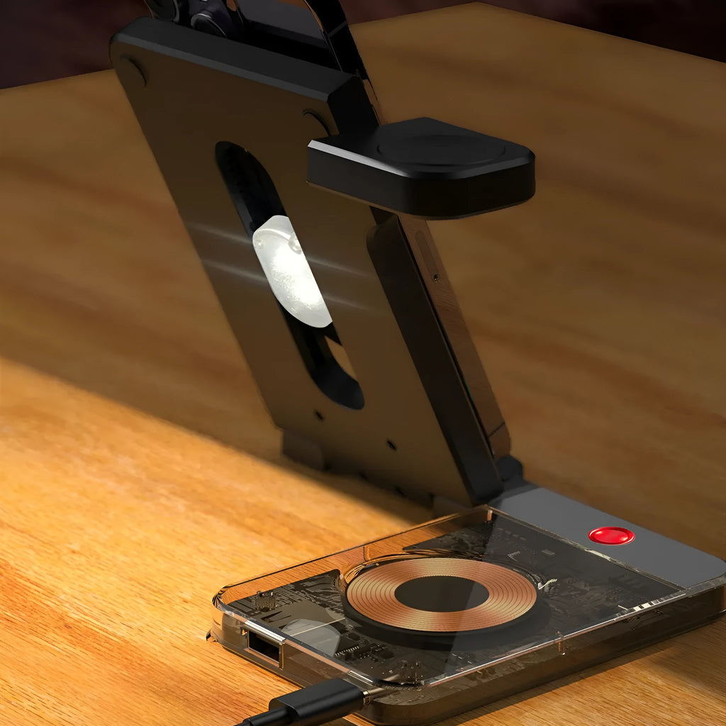 Black foldable wireless charging stand showing phone on magnetic arm, Apple Watch on charger, and earbuds on base.