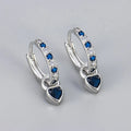 Fashion zircon earrings with heart-shaped eardrops in gold or white gold colour settings with diamond-treated gemstones