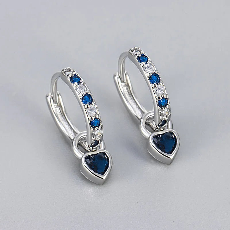 Fashion zircon earrings with heart-shaped eardrops in gold or white gold colour settings with diamond-treated gemstones