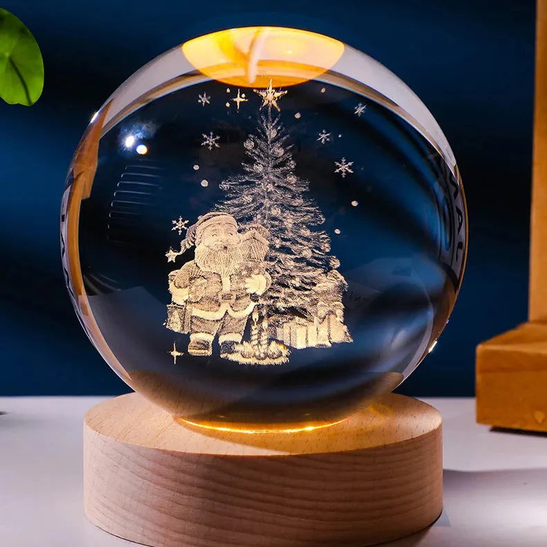 3D crystal ball night light projecting starry sky and planets from its 6cm sphere on a solid wood base.