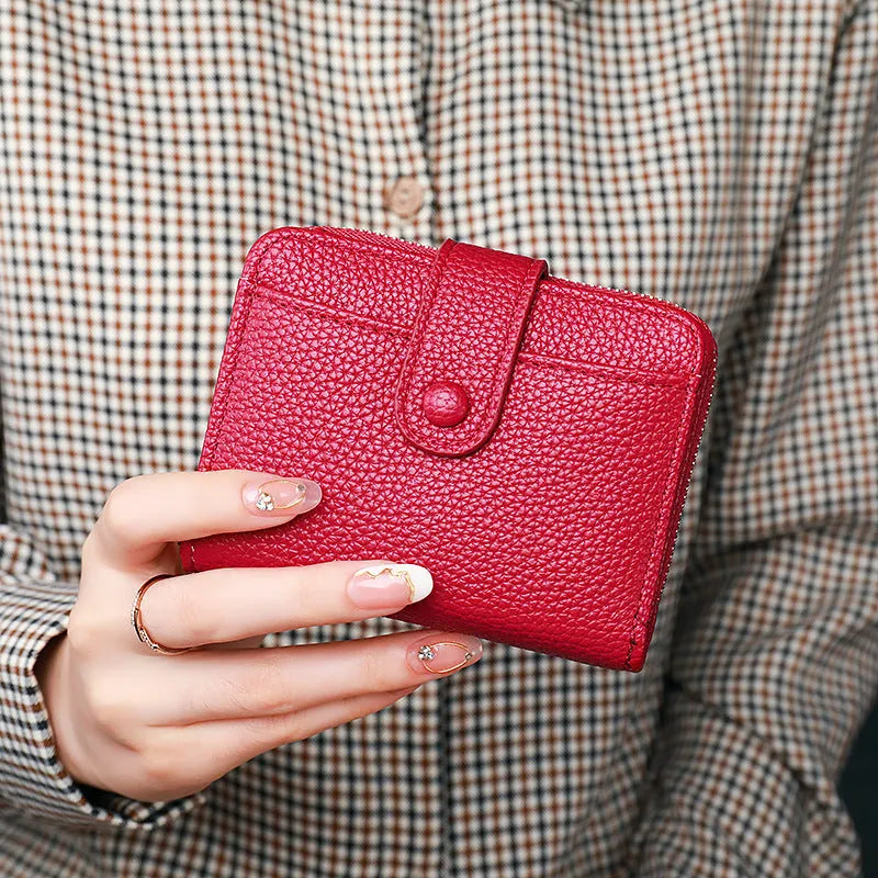Women's lychee pattern organ short wallet in beige with sewing thread accents and antibacterial lining