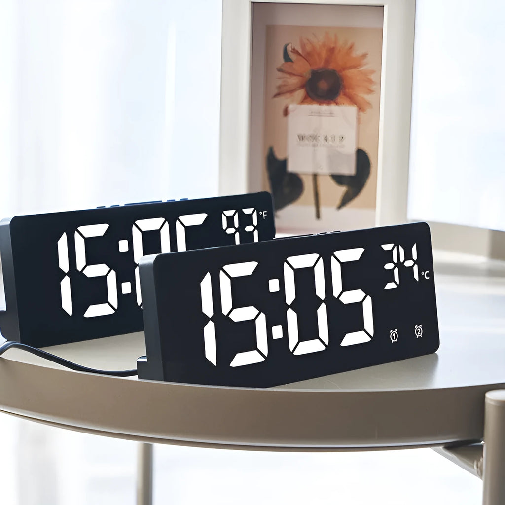Creative multi-functional electronic alarm clock with large LED screen showing time and temperature.