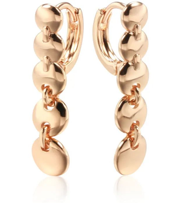 Gold-plated copper circle earrings with hand-woven texture, measuring 6cm in length
