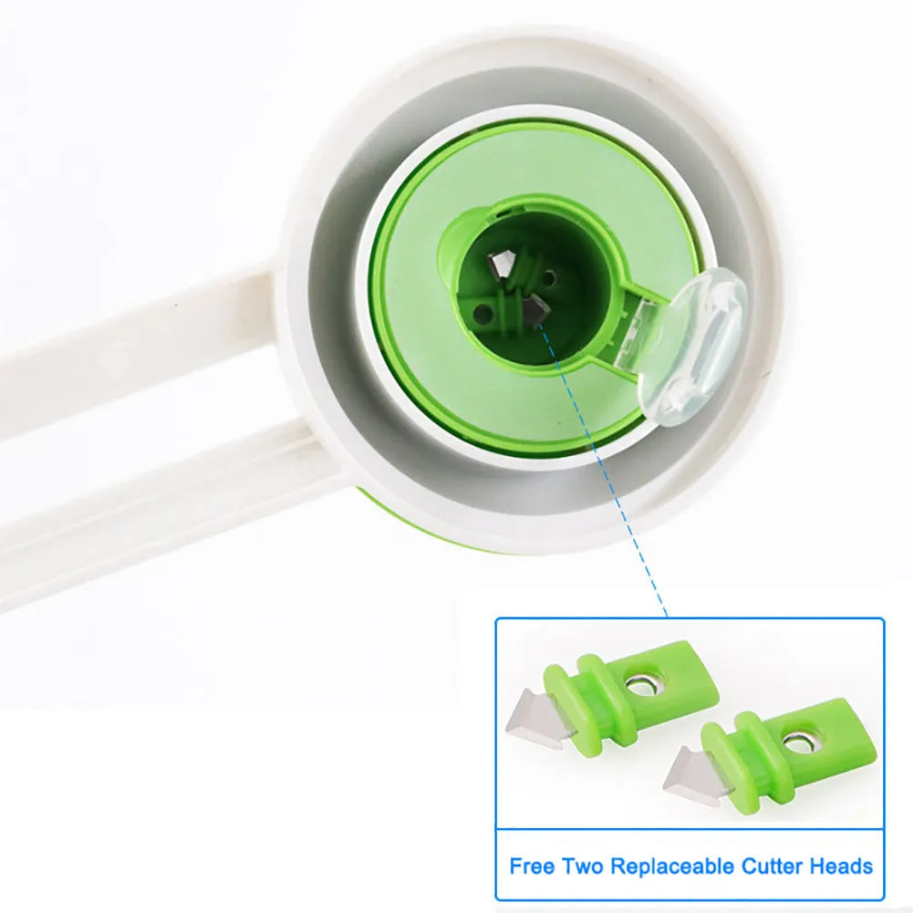 Orange or green plastic round paper cutter on a colour box, capable of cutting A3 paper.