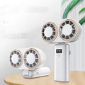 Handheld mini fan with folding neck strap and digital display in milky white colour