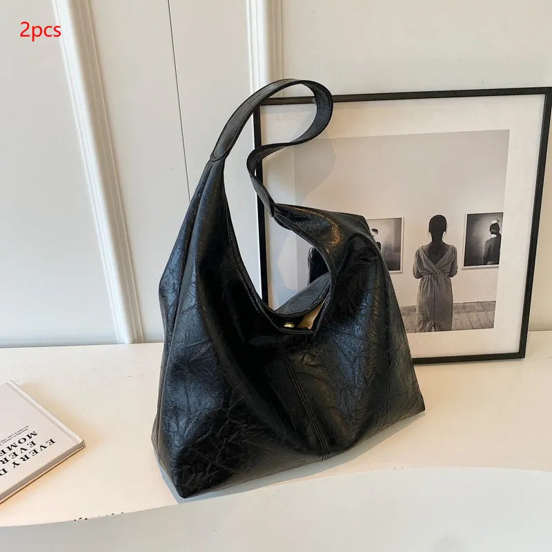 Casual soft PU shoulder bag with sandwich pocket design in black colour showing dimensions and adjustable strap