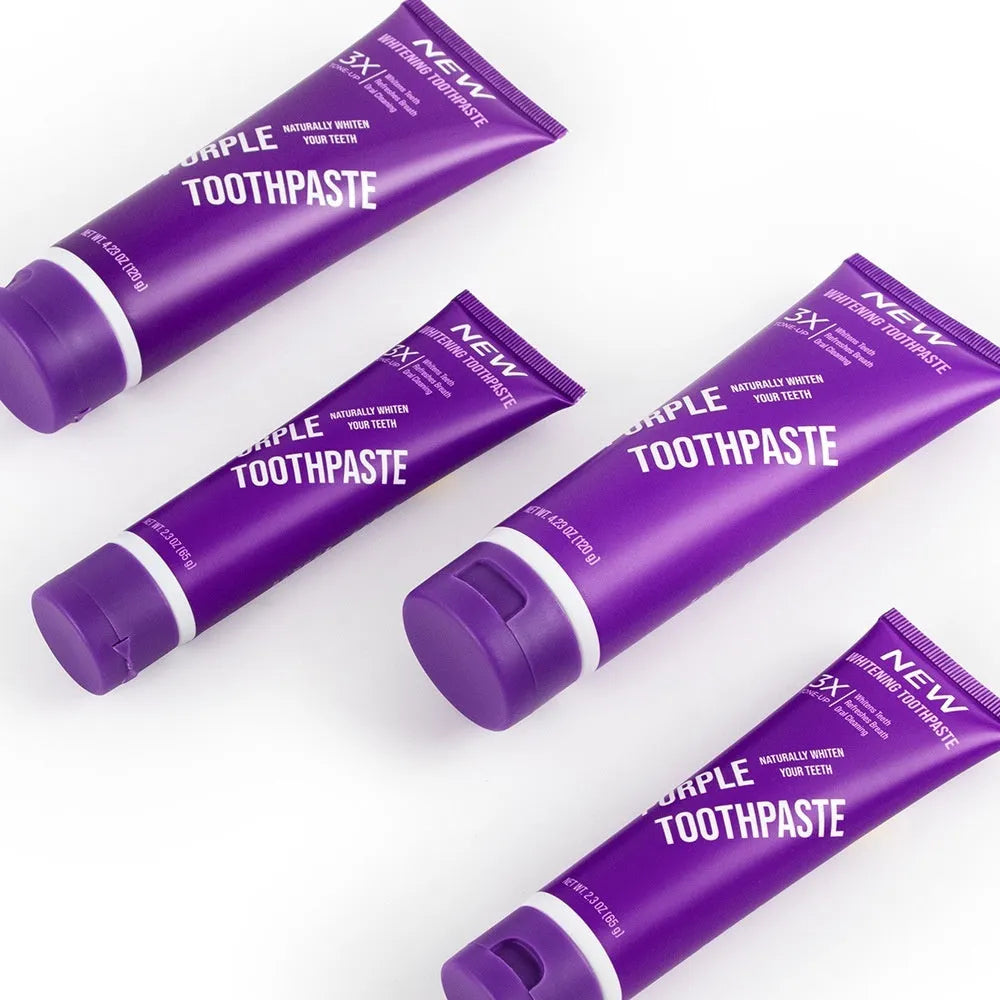 Purple whitening toothpaste tube for adults, shown in 120g and 65g sizes for yellow stain removal.
