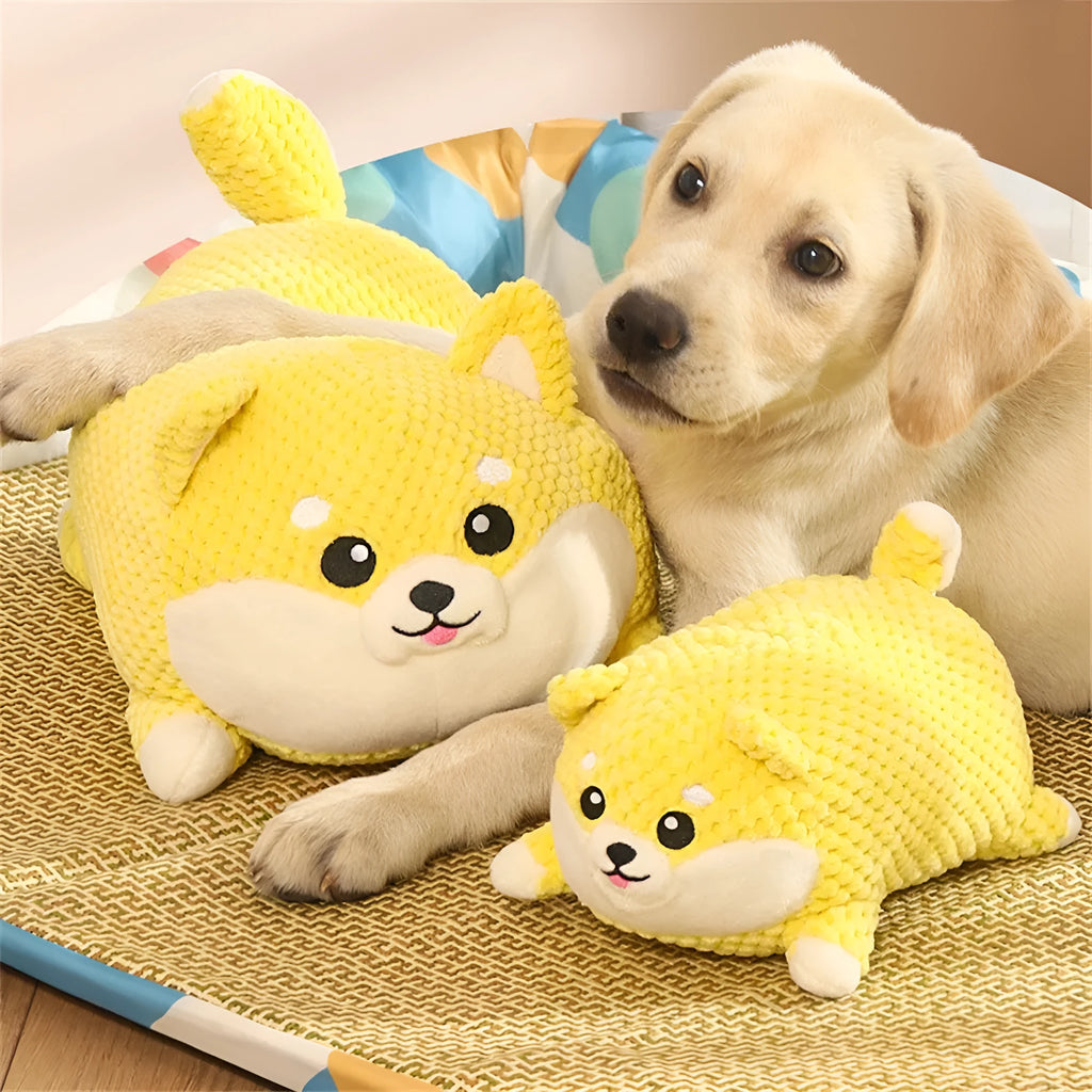 Calming plush dog toy with squeaker vocalisation feature in bite-resistant material