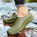 Men's short ankle-height plastic rain boot in a solid colour on a plain background.