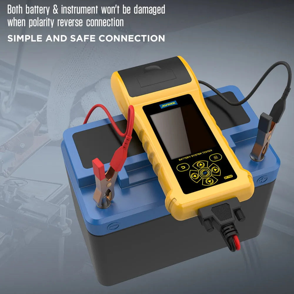 Autool BT760 vehicle battery tester with colour screen, test clips, and printed diagnostic receipt on a workshop bench.