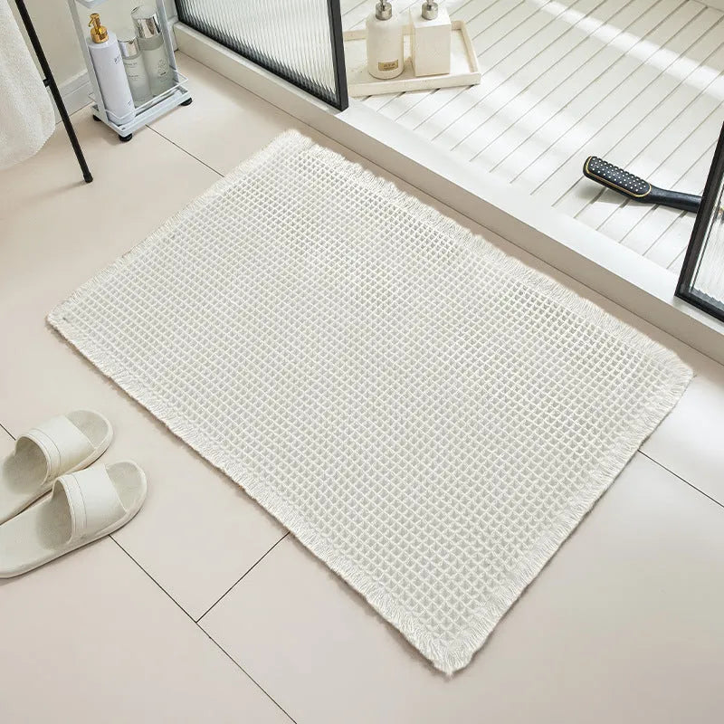 Square checkered pattern bathroom carpet with non-slip backing in beige colour, 61x92cm size
