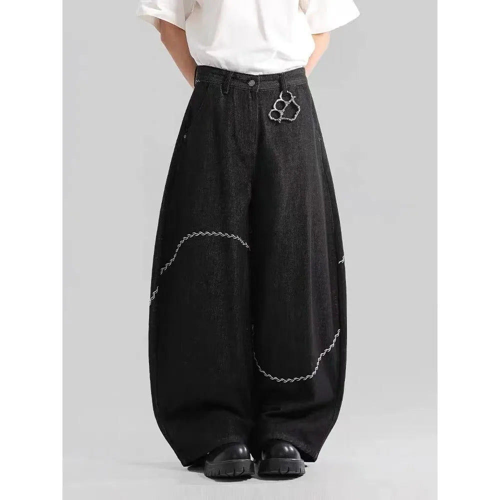 Black straight-leg denim trousers with mid-waist and zip placket on hanger showing micro-elastic polyester fabric