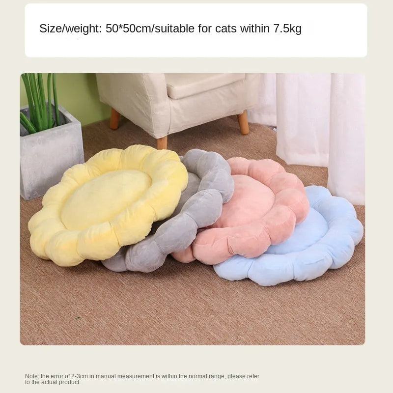 Blue half-surrounded plush pet bed with multi-colour petals, measuring 50x50cm, for cats and small dogs.