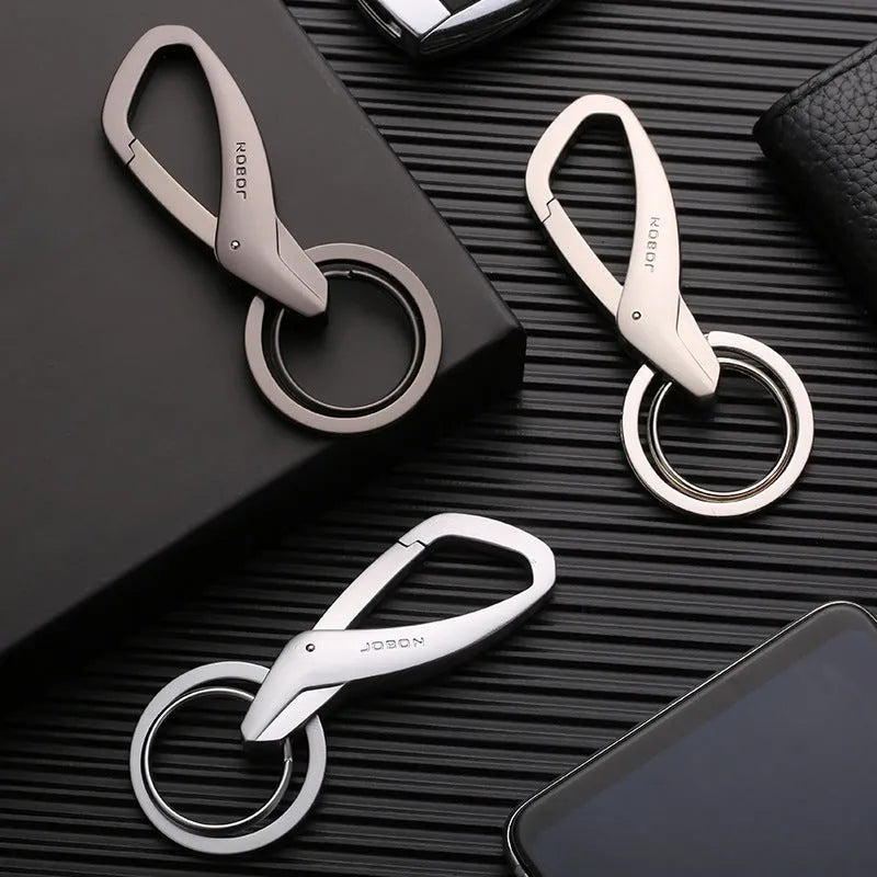 Zinc alloy double ring car key chain measuring 8.3x3.5cm in black, chrome, and nickel finishes