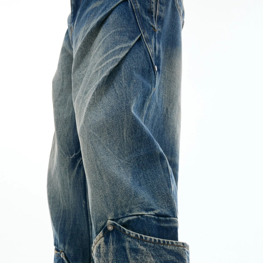 Men's verdant blue jeans with washed burst pattern and curved knife detailing, loose fit design