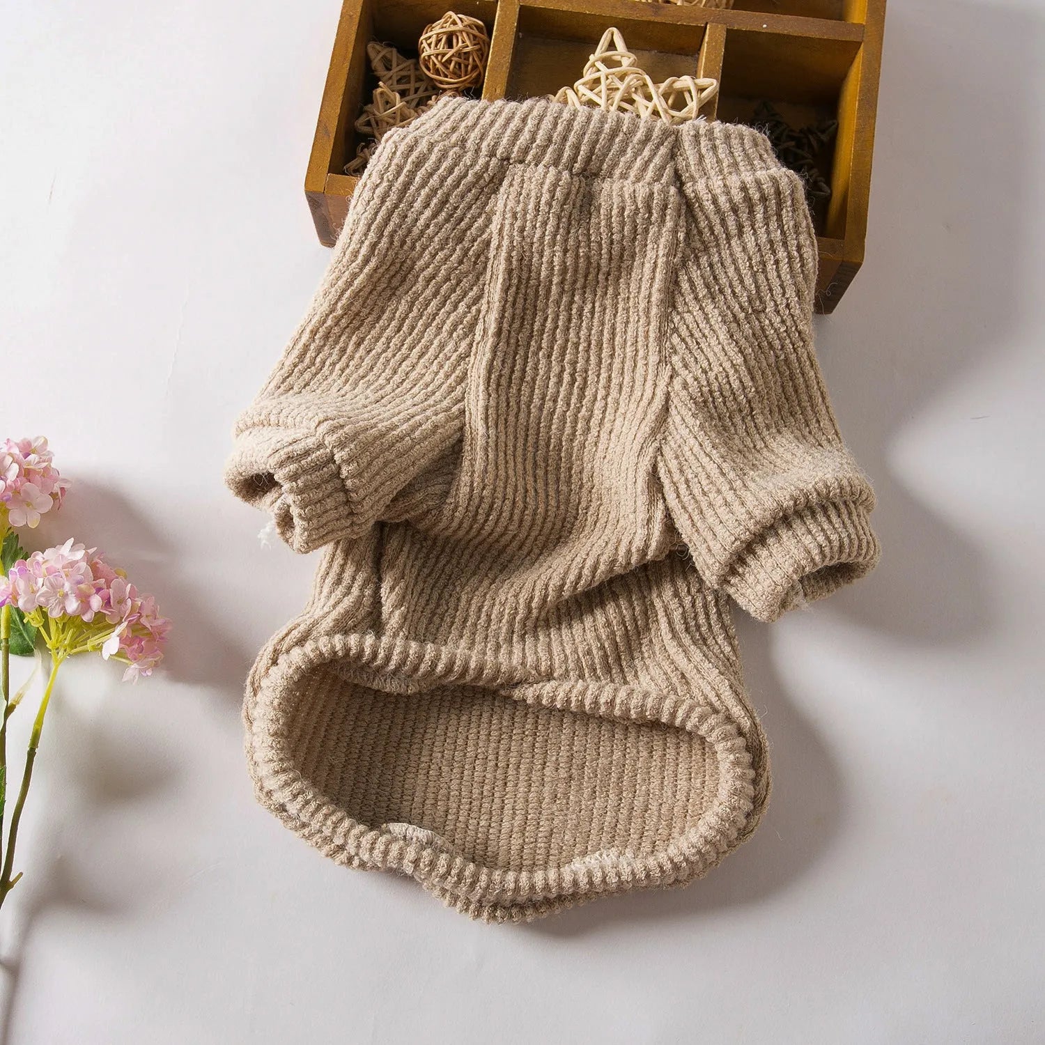 Brown cloth sweater for small dog on white background showing pullover design and casual style