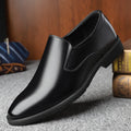 Men's black leather business casual slip-on loafers with leather toe cap and rubber sole