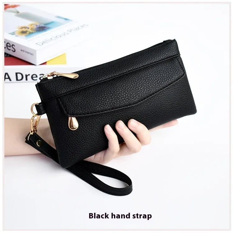 Soft PU leather crossbody bag in pine leaf green with a horizontal square shape and shoulder strap