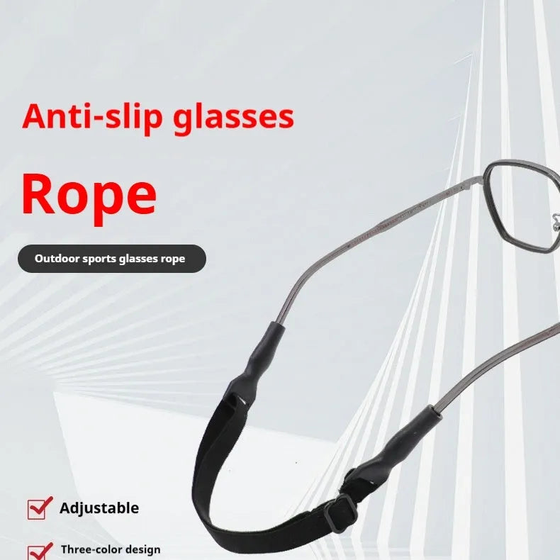Black adjustable glasses cord with silicone earpiece tips on spectacles