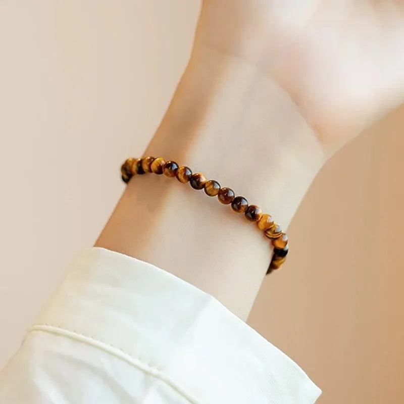 Handmade tigereye stone bracelet with geometric design and round elements in new Chinese style