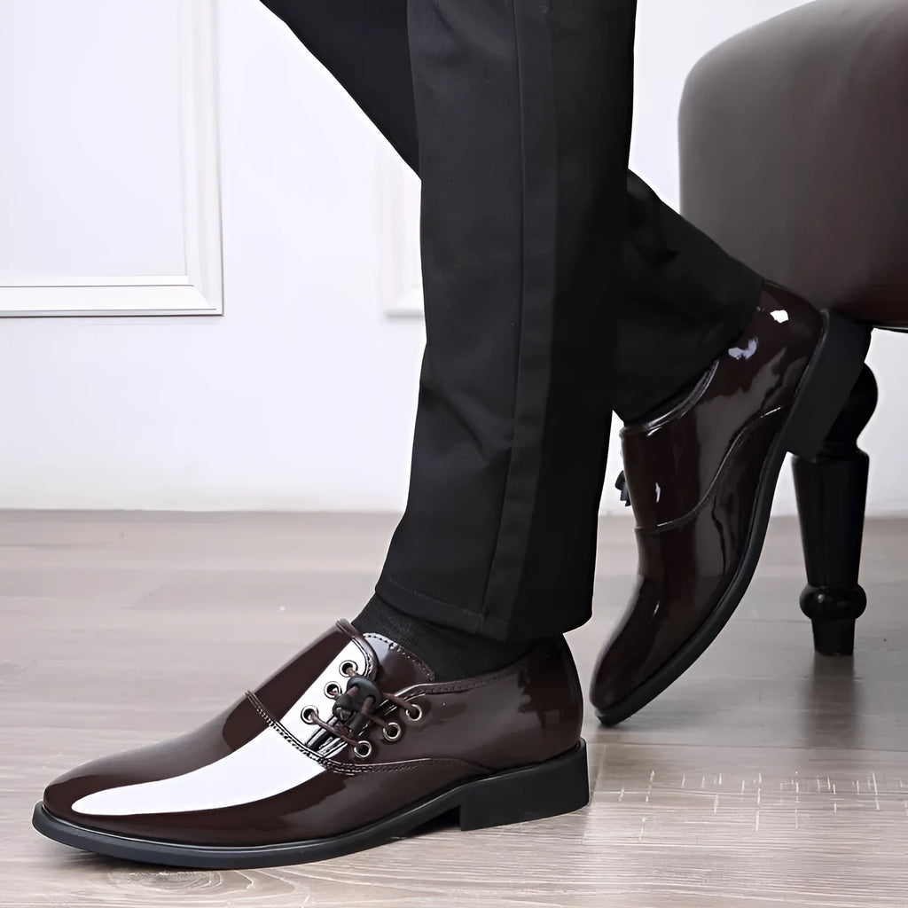 Men's black and brown formal business shoes with a square heel and round toe design on a rubber sole.