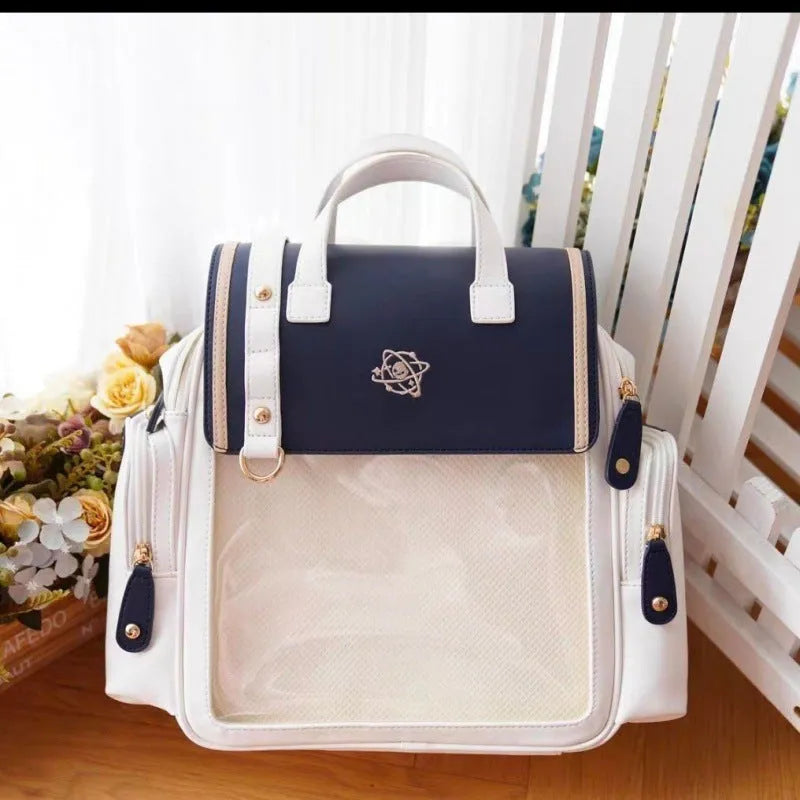 Japanese style transparent colour backpack in blue or brown with soft polyester body, sandwich pocket, and transparent rubber plate.
