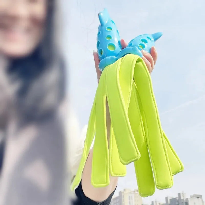 Blue cuttlefish-shaped dog chew toy approximately 39cm long with rubber and waterproof cloth construction