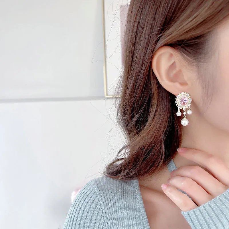 Oval zircon inlaid pearl tassel earrings with geometric copper design and 2.5cm drop