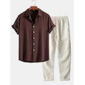 Men's loose fit linen blend shirt and trousers set in various colours, showing short sleeves and casual style