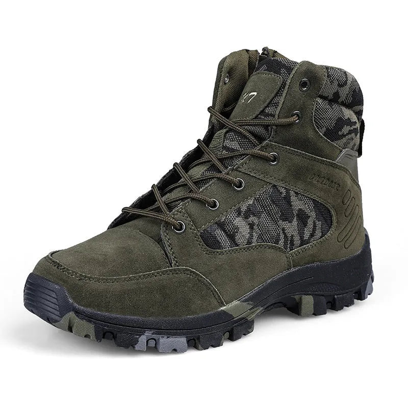 Men's black high-top hiking shoe with metal accents and PU upper on a rocky outdoor path.