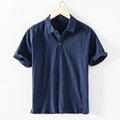 Men's loose fit linen shirt in solid colour with natural fabric texture, showing relaxed sleeve and collar design