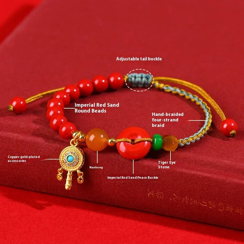 Hand-woven cinnabar bracelet with geometric peace blessing buckle in emperor red sand colour