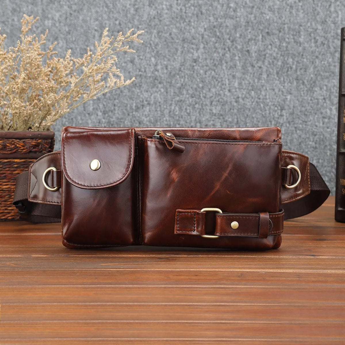 Men's black or brown leather belt bag with first layer cowhide, cotton lining, and sewing line detail.