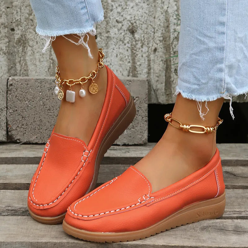 Women's PU leather loafers with car suture detailing, flat heel, available in UK sizes 35-42
